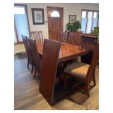 Wood Dining Set in a classic Mission style featuring vertical slat-back chairs and an extendable table 72x44-2 leaves 18” each-Nice piece