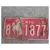 1961 wyoming license plate with custom bullet hole