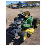 John Deere Riding Mower - Wrecked, Parts Only, Gas, no key available. Buyer responsible for equipment needed to load this item. (Preview and Pickup at Fleet)