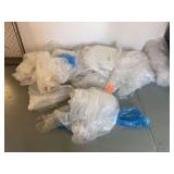 Lots of plastic mattress covers - makes good paint tarps