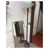 Beveled edge mirror and floor lamp