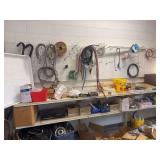 Wall full of parts and accessories - stove parts, washing machine parts, miscellaneous hardware