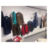 All clothing hanging on wall