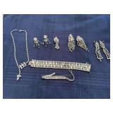 Bling jewelry, clip and screw earrings, bracelets are marked Kramer but missing stones