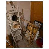Variety of frames some with art, wicker stands, wood stand
