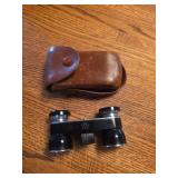 Vintage Toko Pride 2.5x opera glasses in a black finish with a matching brown leather case