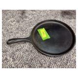 Lodge round flat griddle marked 7 90G