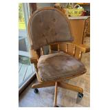 Four dining chairs w arms and on wheels Not made specifically for this table, but they look great with it