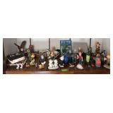 Home decor including Precious Moments, glass insulators, wood carved figurines by Glenn Oldorf and more
