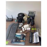 Bushnell binoculars, Simmons binoculars, Cobra 38WXST handheld radios, clocks, luggage scale, etc