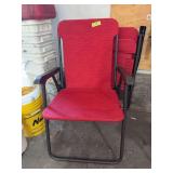 2 red folding chairs
