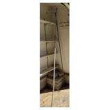 Qty of cement landscape block and two homemade shepherds hooks