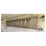 24’ aluminum extension ladder and 11’ wooden straight ladder