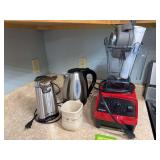 VitaMix blender, Hamilton Beach electric can opener, Hamilton Beach water kettle and Longaberger mug