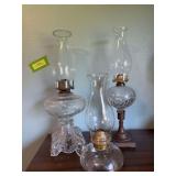 Three oil lamps