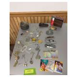 Knives, wallet, necklaces, watches, etc