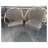 Two expanded metal patio chairs
