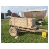 Little modified car truck rear end made into a end-gate seeder wagon or even including some golf clubs in there so we when you get your new fairway built you can practice