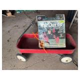 Red coaster wagon and jarts