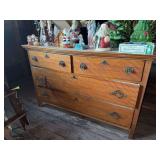 Four drawer dresser w mirror Dresser measures 22D x 48L x 30H