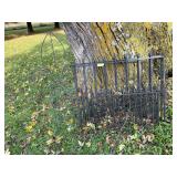 Fence sections and fluer de lis yard decor
