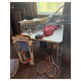 Golf clubs, badminton set, tennis rackets, etc