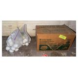 Box of clay pigeons and some golf balls