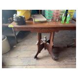 Parlor table on porcelain wheels 22x29x29H NO CONTENTS!