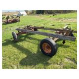 Wagon running gear with hydraulic hoist
