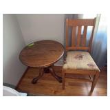 24x23 oak ball and claw side table and padded oak dining chair Table does have some damage to top, see photos
