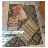 Five various sized rugs