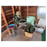 Bird waterer, wreaths, and planters