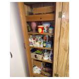 In LEFT cupboard includes vases, cleaning supplies, old tins, turkey roaster, etc