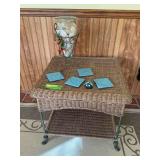 Small wicker side table and decor