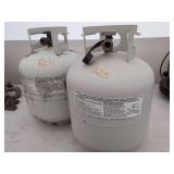 Two empty 5 gallon propane tanks