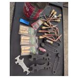Can of miscellaneous welding supplies. Strikers , tips