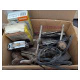 Miscellaneous box with screwdrivers woodworking tools oilmatic chainsaw chains tape measure