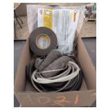 Box of miscellaneous hoses and weather seal tape