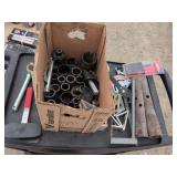 Box of large sockets and mis