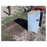 Metal cabinet with large heavy grate