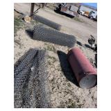 One large roll chaining fins and miscellaneous chain link fencing and a air tank