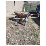 Assorted Outdoor Implements: Wheelbarrow, Pump, Plant Hanger
