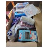 Paper napkins. Paper plates, spoons, cups, tablecloths, plastic silverware, dishcloths