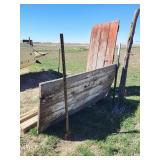 2 vintage old barn doors, 
Two fence posts (old)