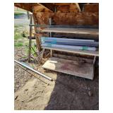 Gondola shelving, shop lights, rebar, cement stake lot