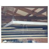 Extra wood hanging from the ceiling, plywood sheets, pegboard, lattice, styrofoam installation. Support structure not included