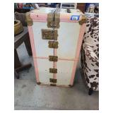 Wardrobe Trunk with Hangers and Pink Fabric Drape