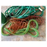 Water hose, water bucket, extension cord and a rop