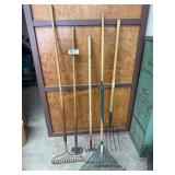 Lot of rakes and a hoe