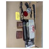 Telescoping fishing pole, rifle cleaning kit,